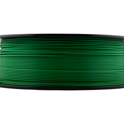 Spool of green filament on a white background